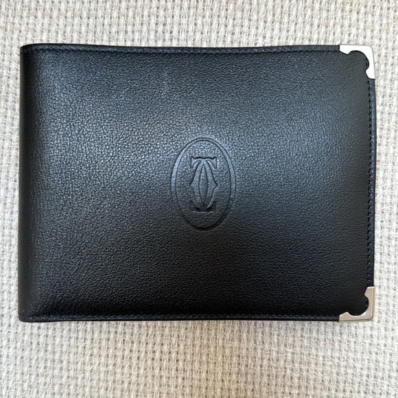 Cartier wallet. NWOT Brown exterior, burgundy interior. Shopping bag included. - Picture 10 of 10